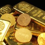 Monedas y lingotes de oro y plata como inversión